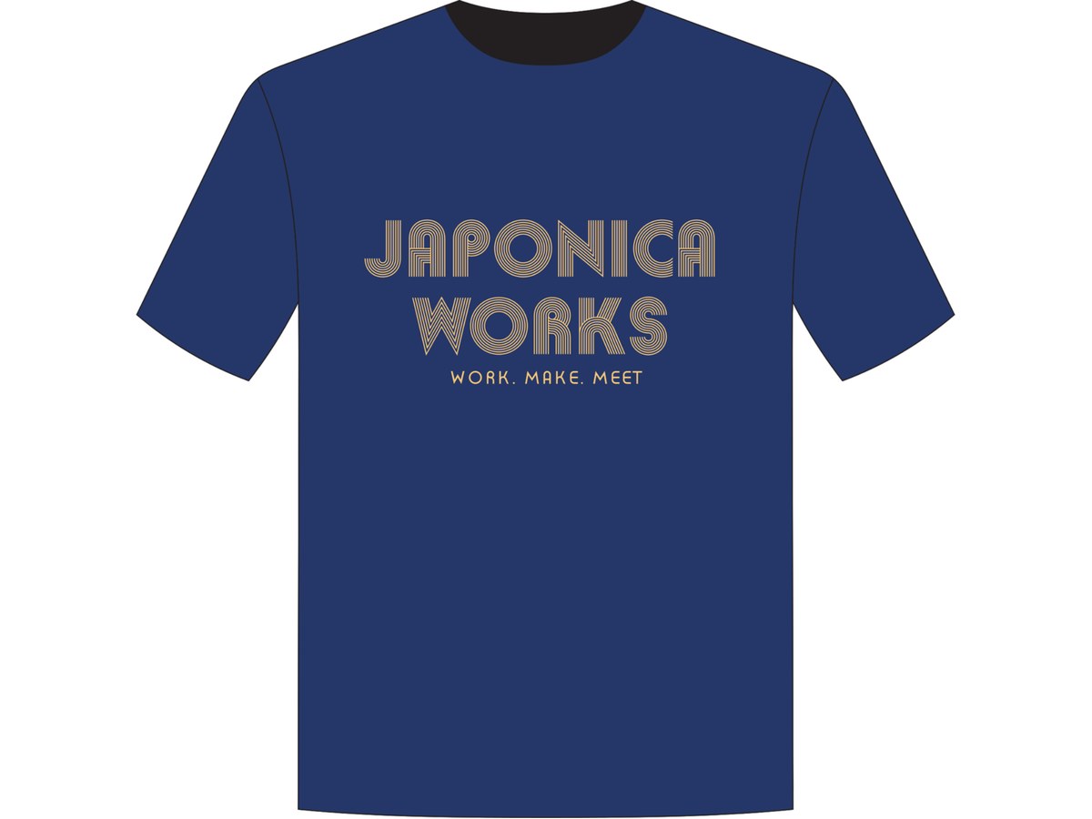 Navy T-shirt with the stacked Japonica Works logo and the tagline Work. Make. Meet.